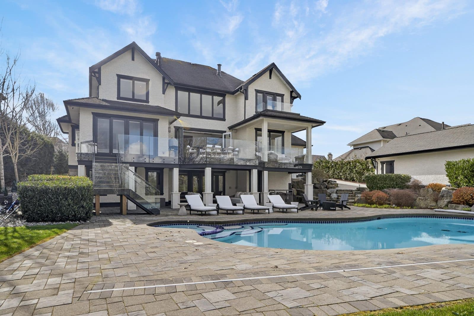 Full back of the home with the pool